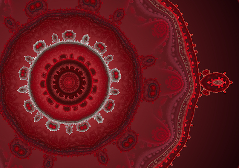 An ornate circular fractal of deep red and silver, like a crown studded with gems.